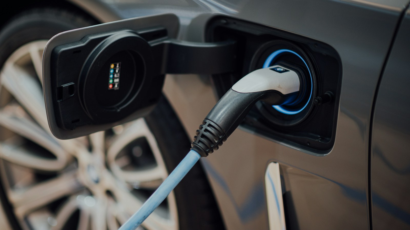 Electric vehicle connected to a charging cable