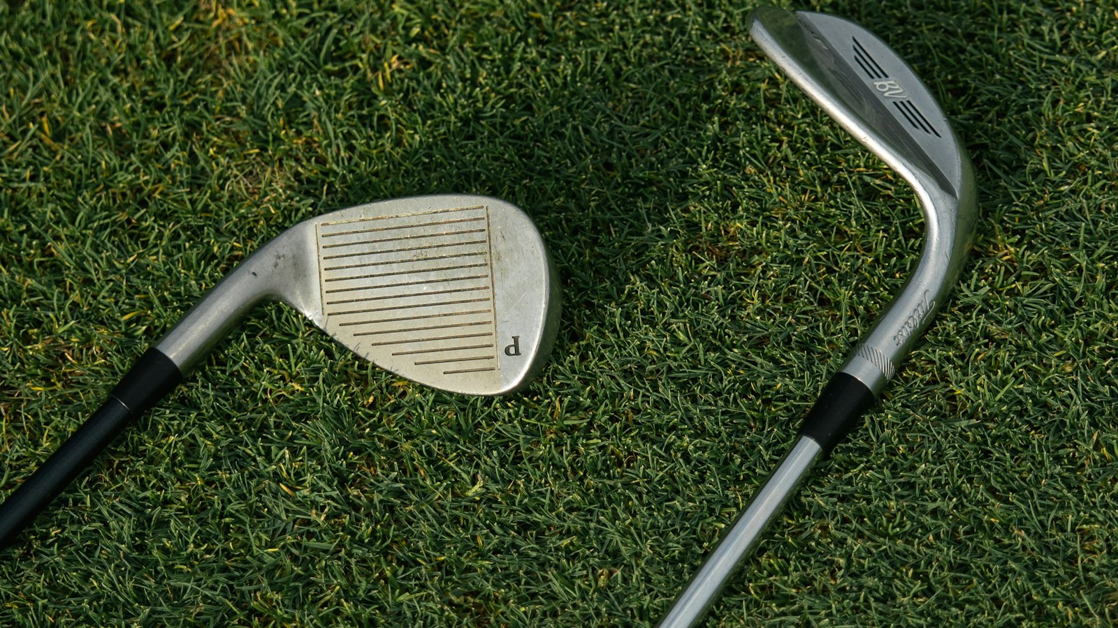 Patent Lawyer for Golf Equipment | Schell IP | Schell IP: Premier Patent Law Support Golf equipment resting on grass